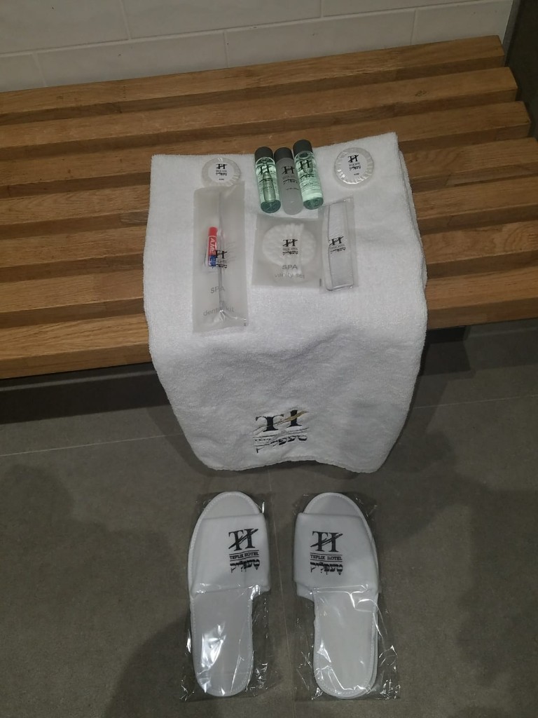 Towels, toiletries, and slippers